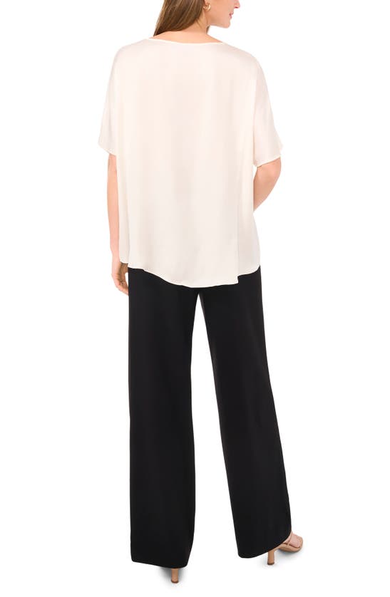 Shop Vince Camuto High-low Baggy T-shirt In New Ivory 103