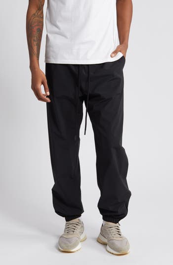 Essentials Women's Studio Woven Stretch Jogger Pant, Black, Small :  : Clothing, Shoes & Accessories