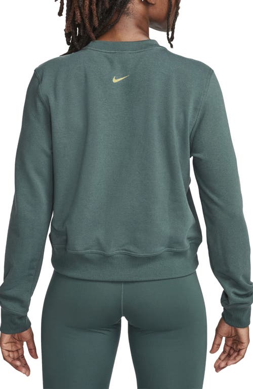 Shop Nike One Dri-fit Crewneck Graphic Sweatshirt In Deep Jungle/bronzine