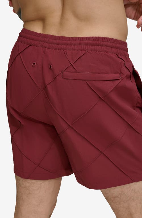 Shop Dkny Diamond Pintuck Swim Trunks In Burgandy