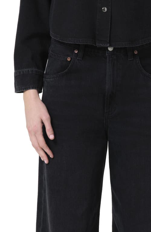 Shop Agolde Low Slung Baggy Jeans In Black Tar