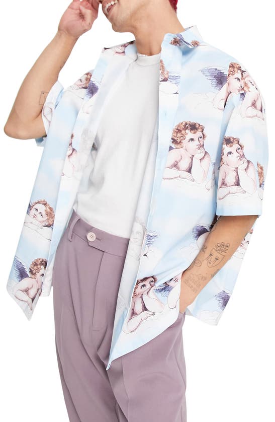 Asos Design Cherub Print Oversize Short Sleeve Button-up Shirt In Light Blue