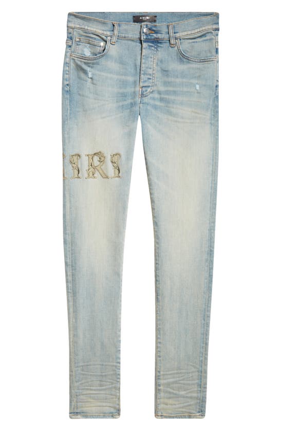 Shop Amiri Baroque Logo Distressed Nonstretch Denim Jeans In Antique Indigo