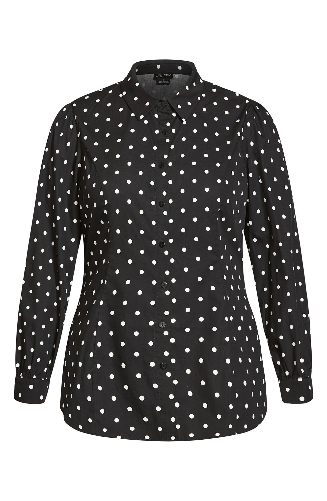 white blouse black spots