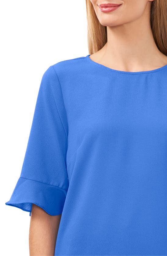 Shop Cece Ruffle Cuff Blouse In Tropic Blue Night