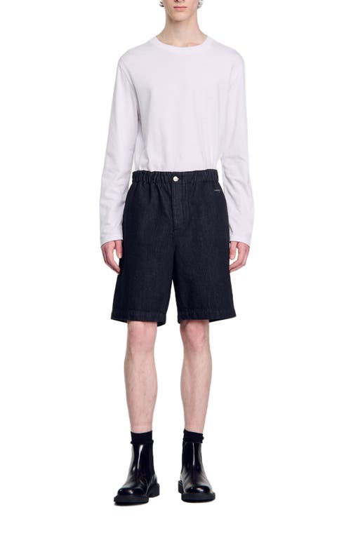 Shop Sandro Raw Denim Bermuda Shorts In Black