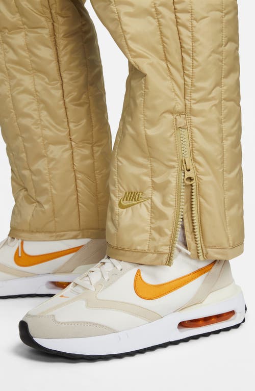 Shop Nike Sportswear Therma-fit Tech Pack High Waist Crop Track Pants In Wheat Grass/barley