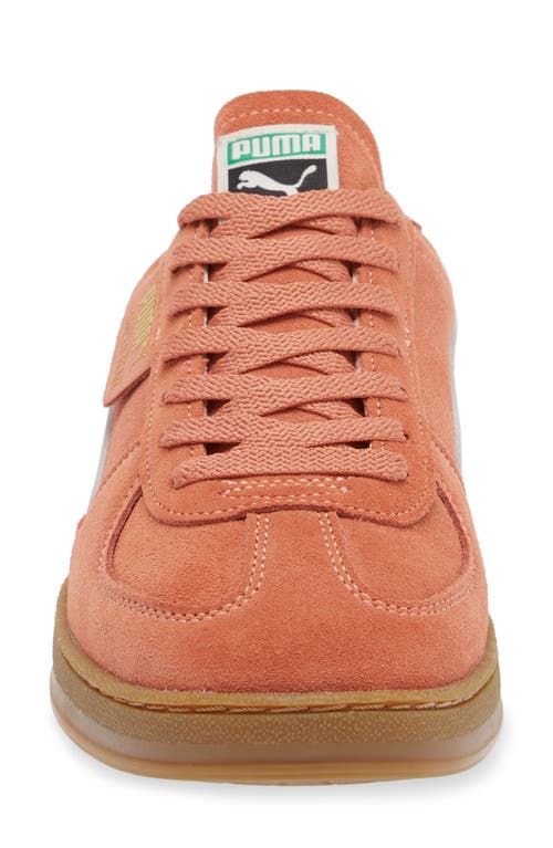 Shop Puma Super Team Low Top Sneaker In Deeva Peach- White