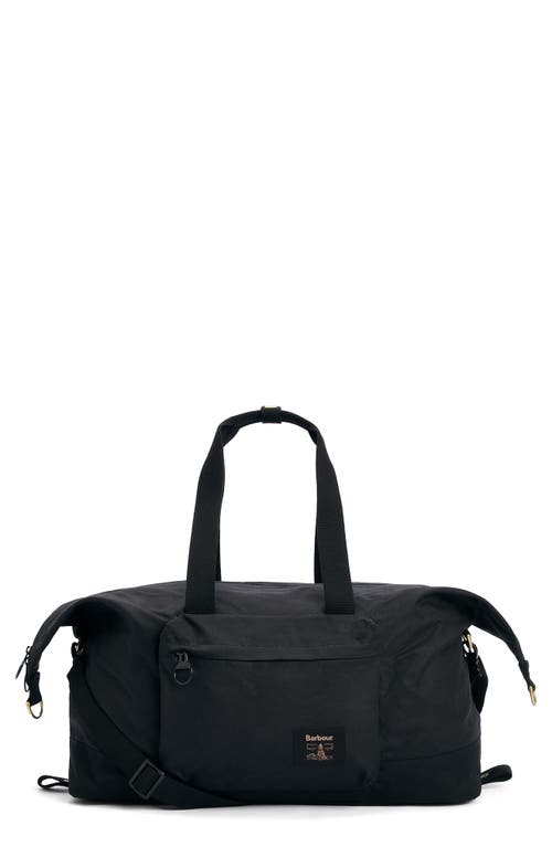 Shop Barbour Field Water Resistant Waxed Cotton Duffle Bag In Black