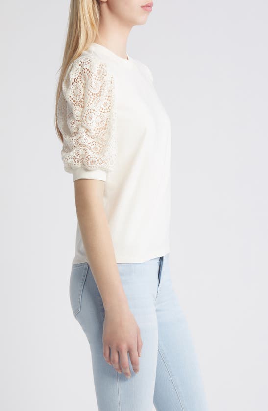 Shop Frame Frankie Lace Puff Sleeve T-shirt In Cream