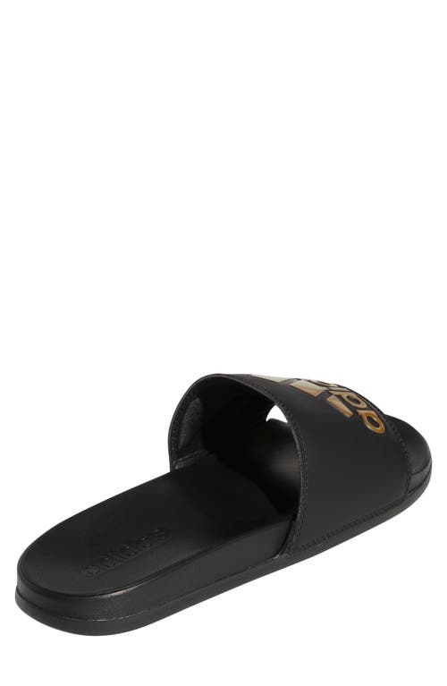 Shop Adidas Originals Adidas Adilette Comfort Slide Sandal In Black/gold Metallic/black