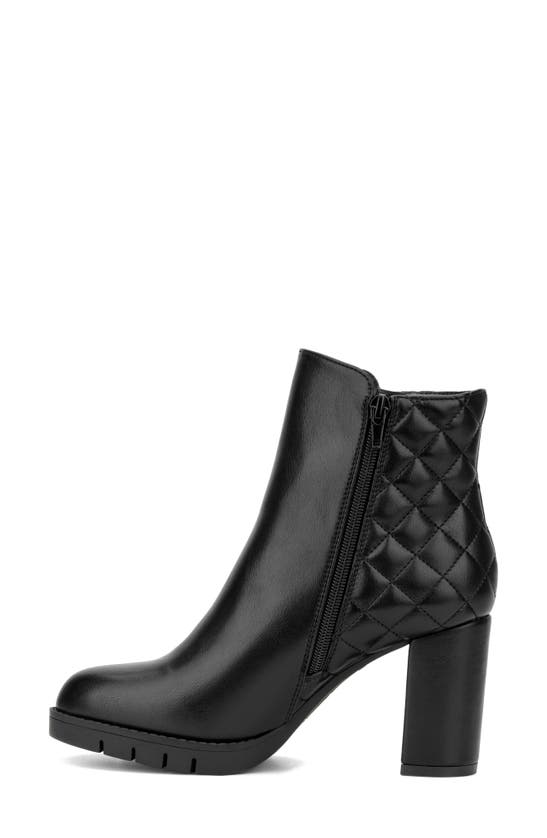 Shop New York And Company Emmalynn Faux Leather Quilted Bootie In Black