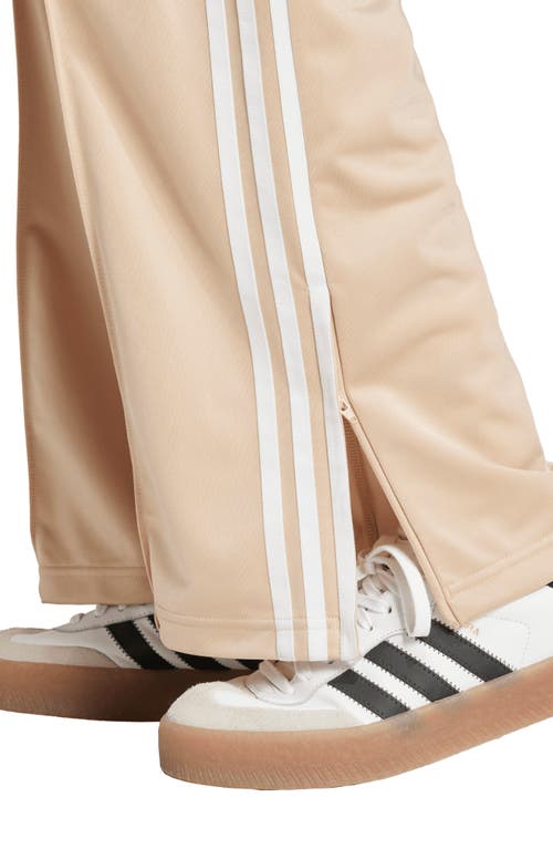 Shop Adidas Originals Adidas Adicolor Firebird Recycled Polyester Track Pants In Magic Beige