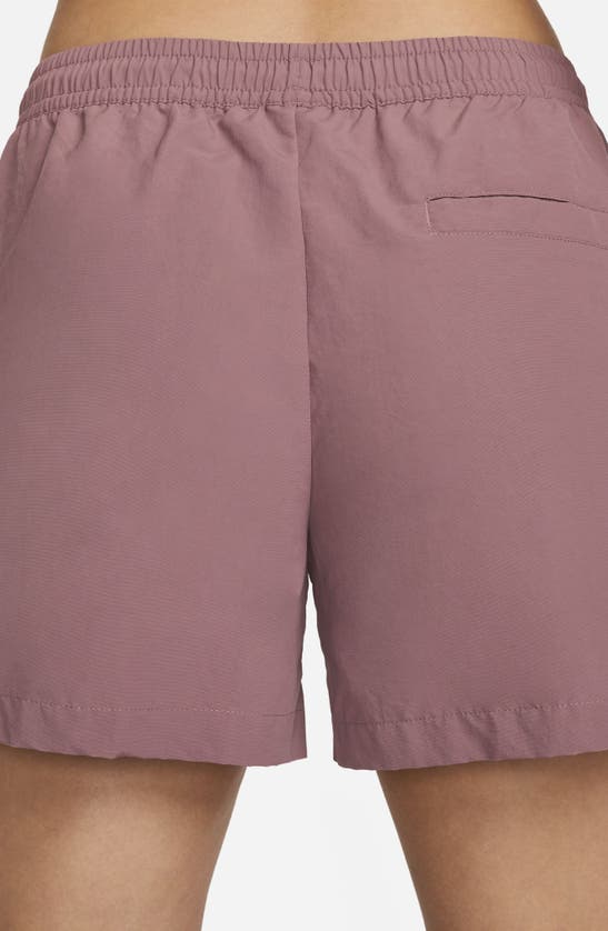 Shop Nike Sportswear Everything Wovens Water Repellent Mid Rise 5-inch Shorts In Smokey Mauve/ Black