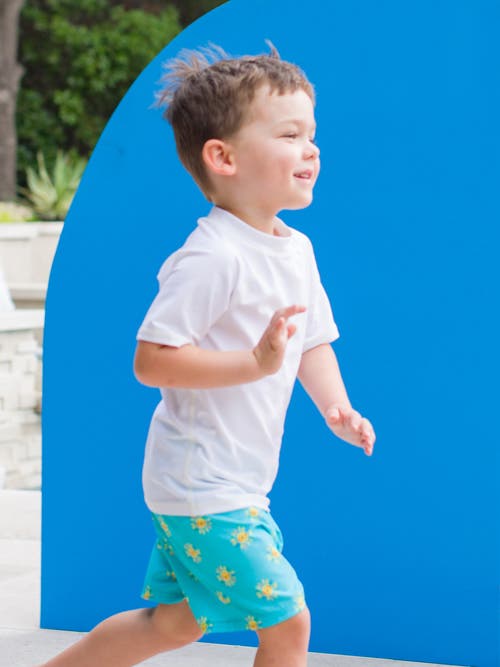 Shop Ruggedbutts Baby Boys Upf50+ Swim Trunks In Blue Sunshiny Day