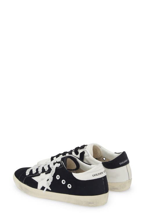 Shop Golden Goose Super-star Low Top Sneaker In White/black