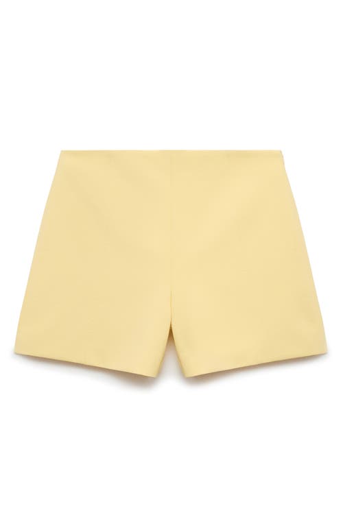 Shop Mango Mid Rise Straight Leg Shorts In Pastel Yellow