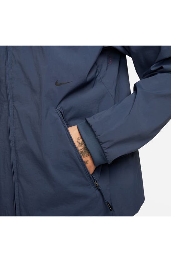 Shop Nike A.p.s. Repel Packable Bomber Jacket In Thunder Blue/ Black