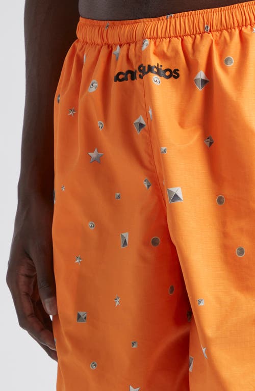 Shop Acne Studios Walter Stud Print Swim Trunks In Bright Orange