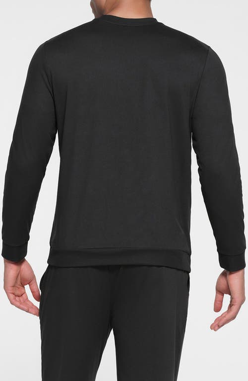 SKIMS SKIMS OUTDOOR JERSEY CLASSIC FIT LONG SLEEVE T-SHIRT 