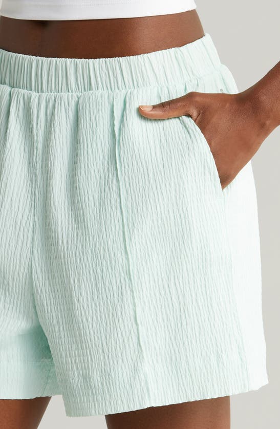 Shop Zella Saylor Crinkle Shorts In Green Glimmer