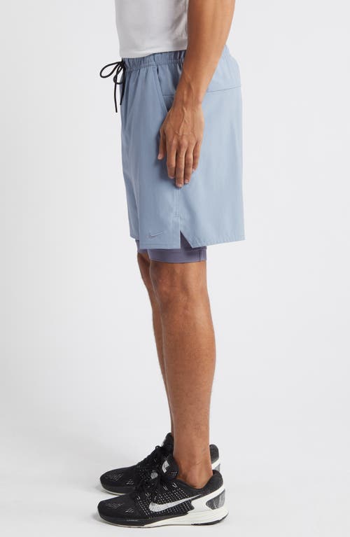 Shop Nike Dri-fit Unlimited 2-in-1 Versatile Shorts In Ashen Slate/light Carbon