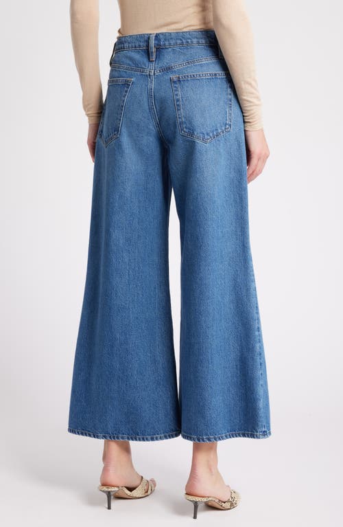 Shop Frame Pixie Easy Wide Leg Flare Jeans In Lucite