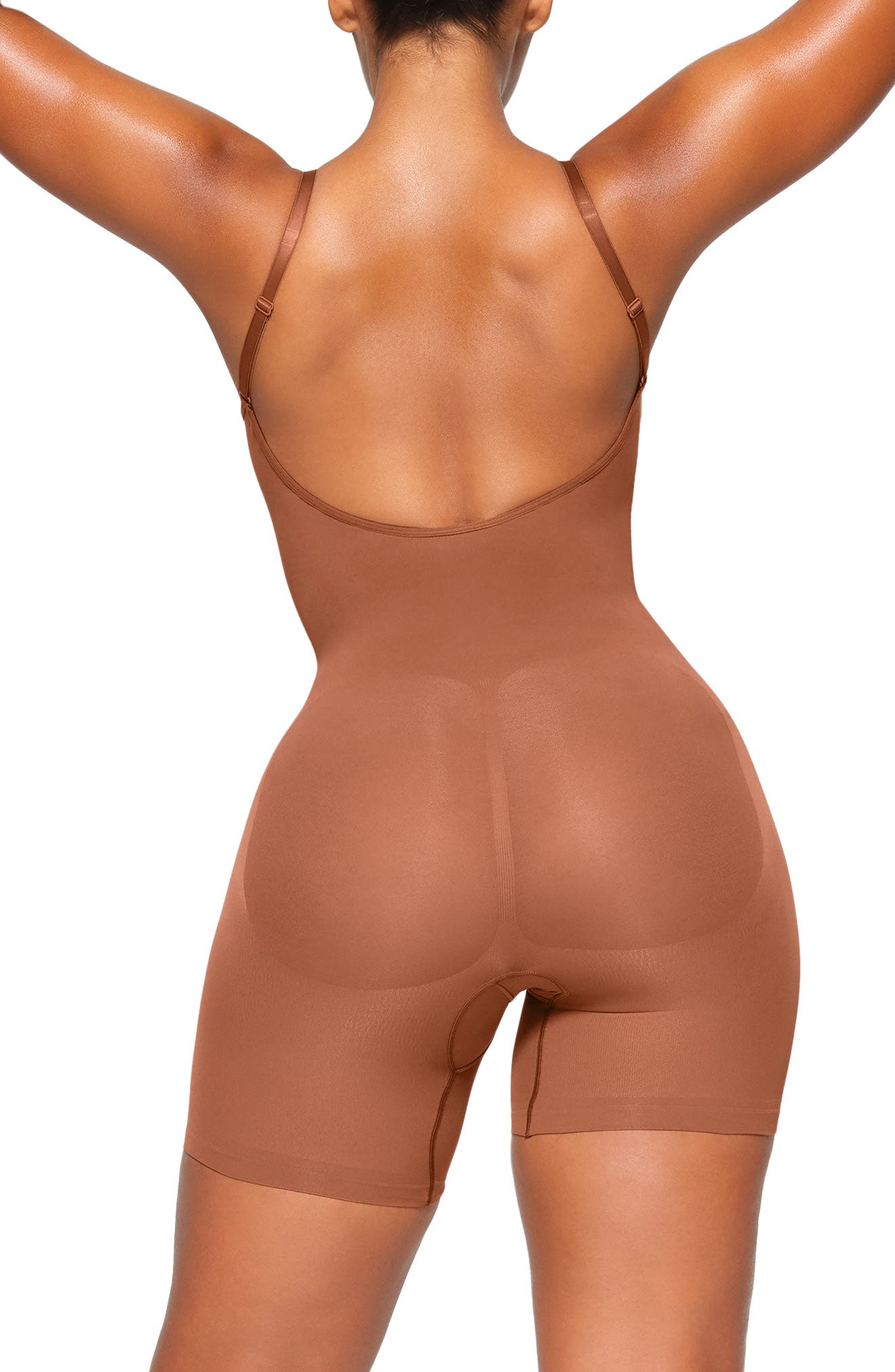 SKIMS Seamless Sculpt Low Back Mid Thigh Bodysuit in Bronze