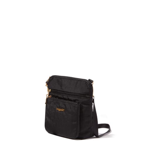 Shop Baggallini Modern Pocket Crossbody Bag In Black With Gold Hardware