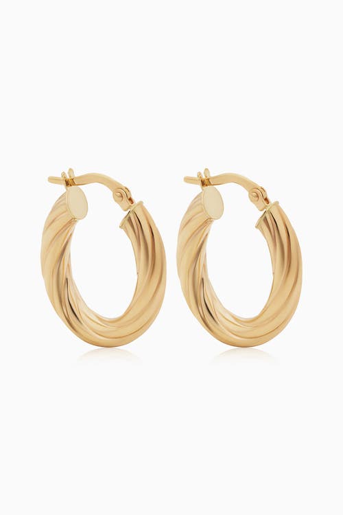 Oradina 10k Gold With A Twist Oval Hoops Earrings In Yellow Gold