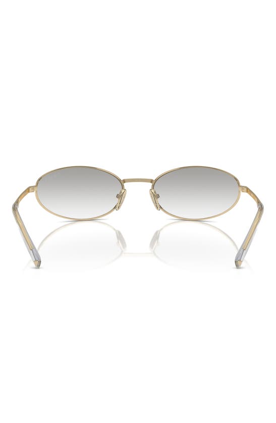 Shop Prada 59mm Oval Sunglasses In Pale Gold