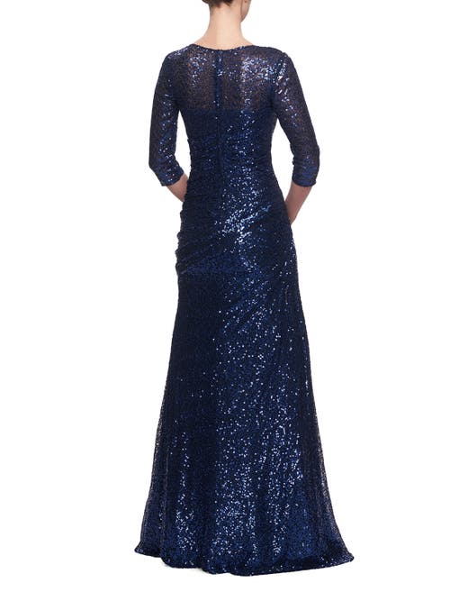 Shop La Femme Floor Length Sequin Gown With Ruching And Sleeves In Navy