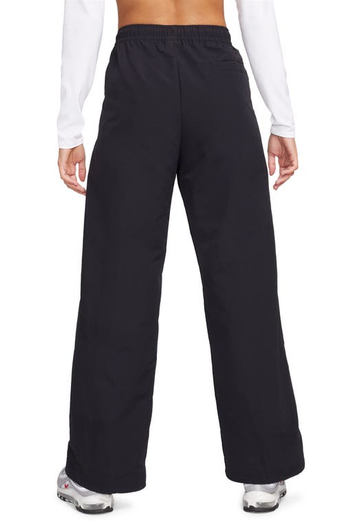 Shop Nike Wide Leg Pants In Black/white