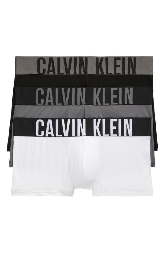 Shop Calvin Klein Assorted 3-pack Performance Microfiber Trunks In Ivory/ Black/grey