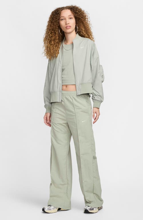 Shop Nike Wide Leg Pants In Jade Horizon/sail