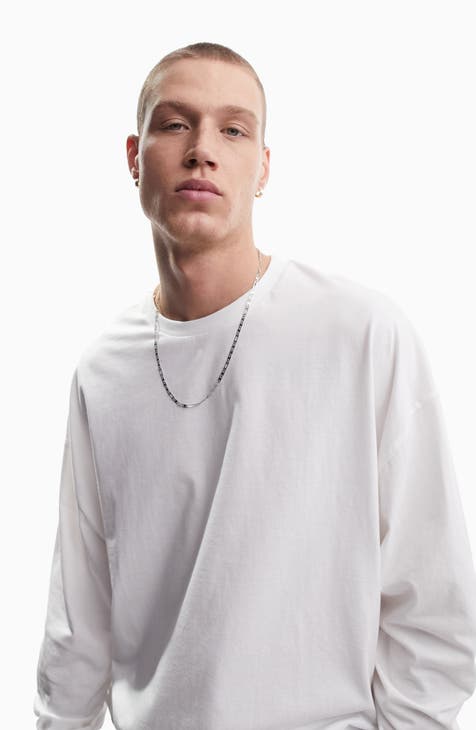 ASOS DESIGN oversized t-shirt with long sleeve and NFL print