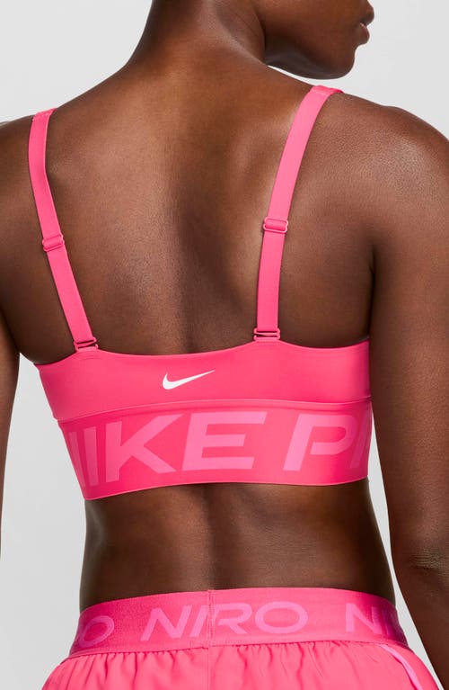 Shop Nike Pro Indy Dri-fit Sports Bra In Aster Pink/pinksicle/white