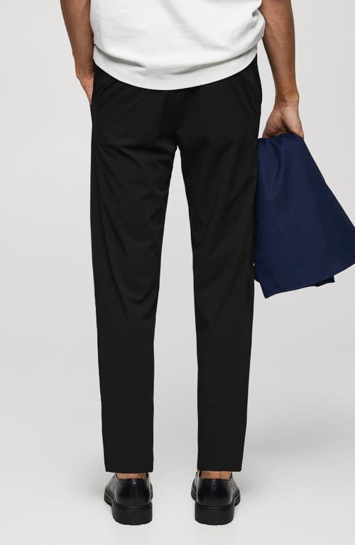 Shop Mango Slim Fit Stretch Pants In Black