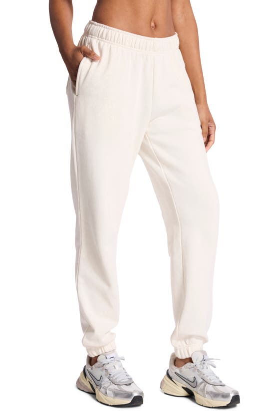 Shop Bandier Embroidered Logo Terry Joggers In Gardenia