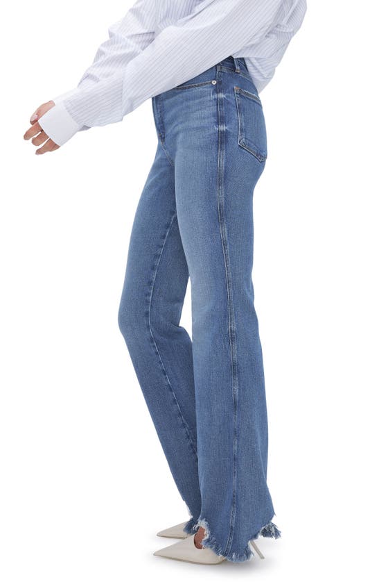 Shop Good American Good Curve Chew Hem Bootcut Jeans In Indigo631