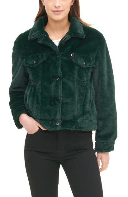 Click to view more detailed imagery on our partner's website Levi's Women's Faux Fur Trucker Jacket In Pine Green