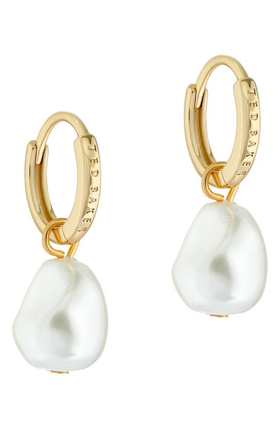Shop Ted Baker Periaa Imitation Pearl Drop Huggie Hoop Earrings In Gold Tone/ Pearl