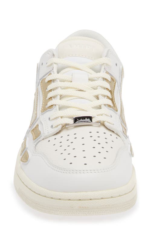 Shop Amiri Metallic Skel Low Top Sneaker In White/gold