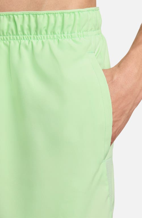 Shop Nike Dri-fit Challenger 5-inch Brief Lined Shorts In Vapor Green/vapor Green