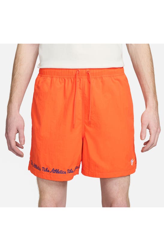 Shop Nike Club Flow Embroidered Nylon Shorts In Safety Orange/ White