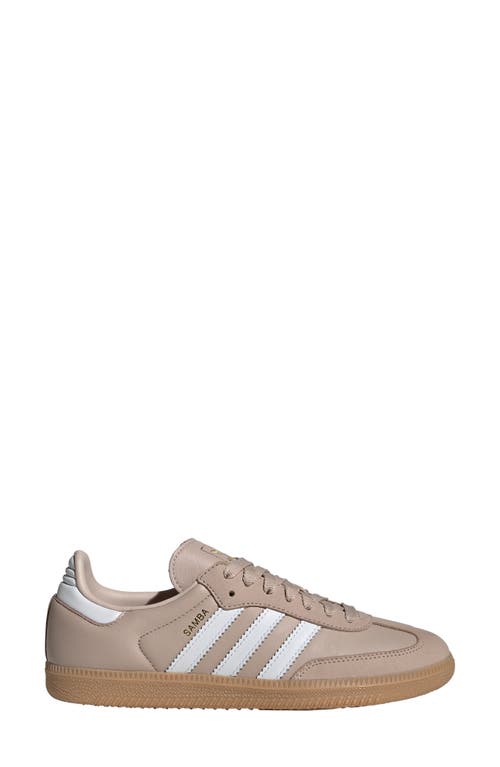 Shop Adidas Originals Adidas Samba Sneaker In Taupe/white/gold Met.