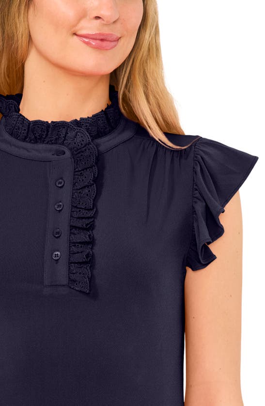 Shop Cece Eyelet Ruffle Detail Crepe Knit Top In Navy Blue Jay