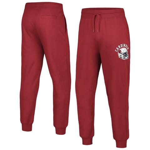 Men's red joggers with stars on the sides