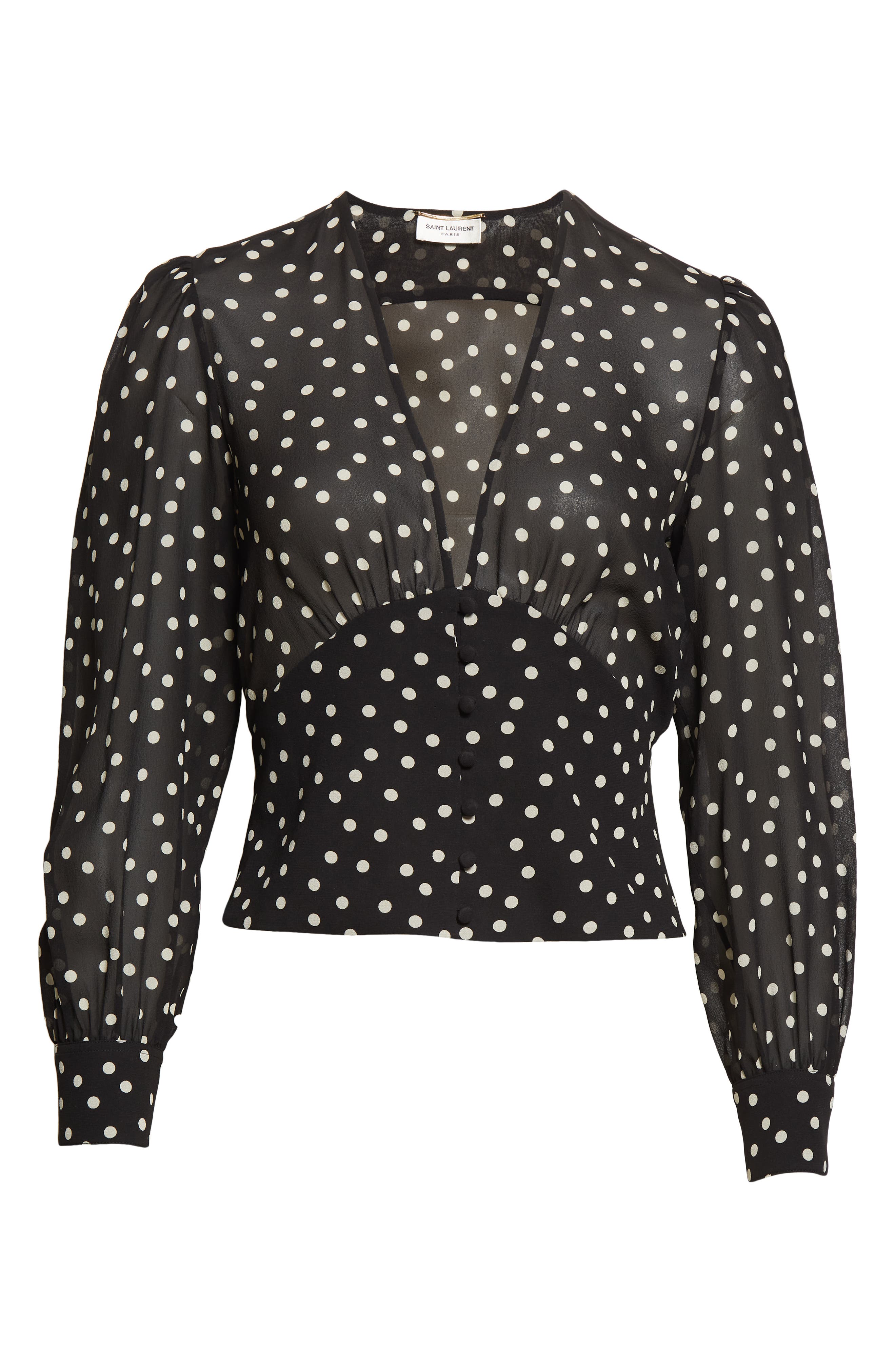 white blouse black spots