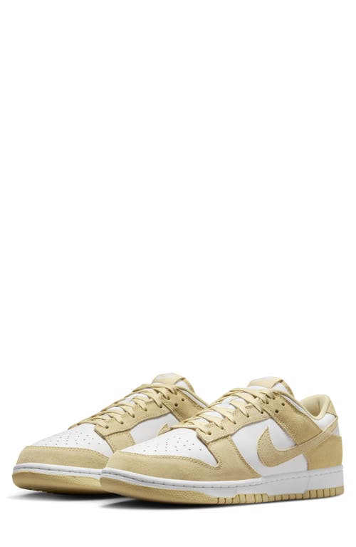 Shop Nike Dunk Low Se Basketball Sneaker In White/tm Gold/white